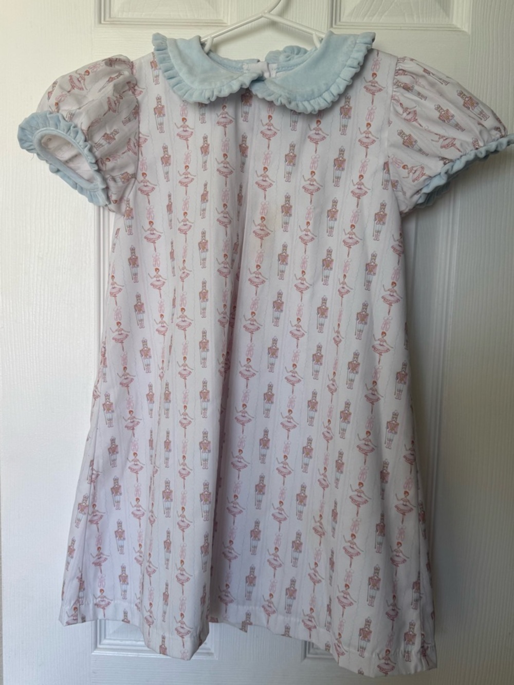 James and Lottie Girls White Nutcracker Print Dress with Pale Blue Velvet Collar